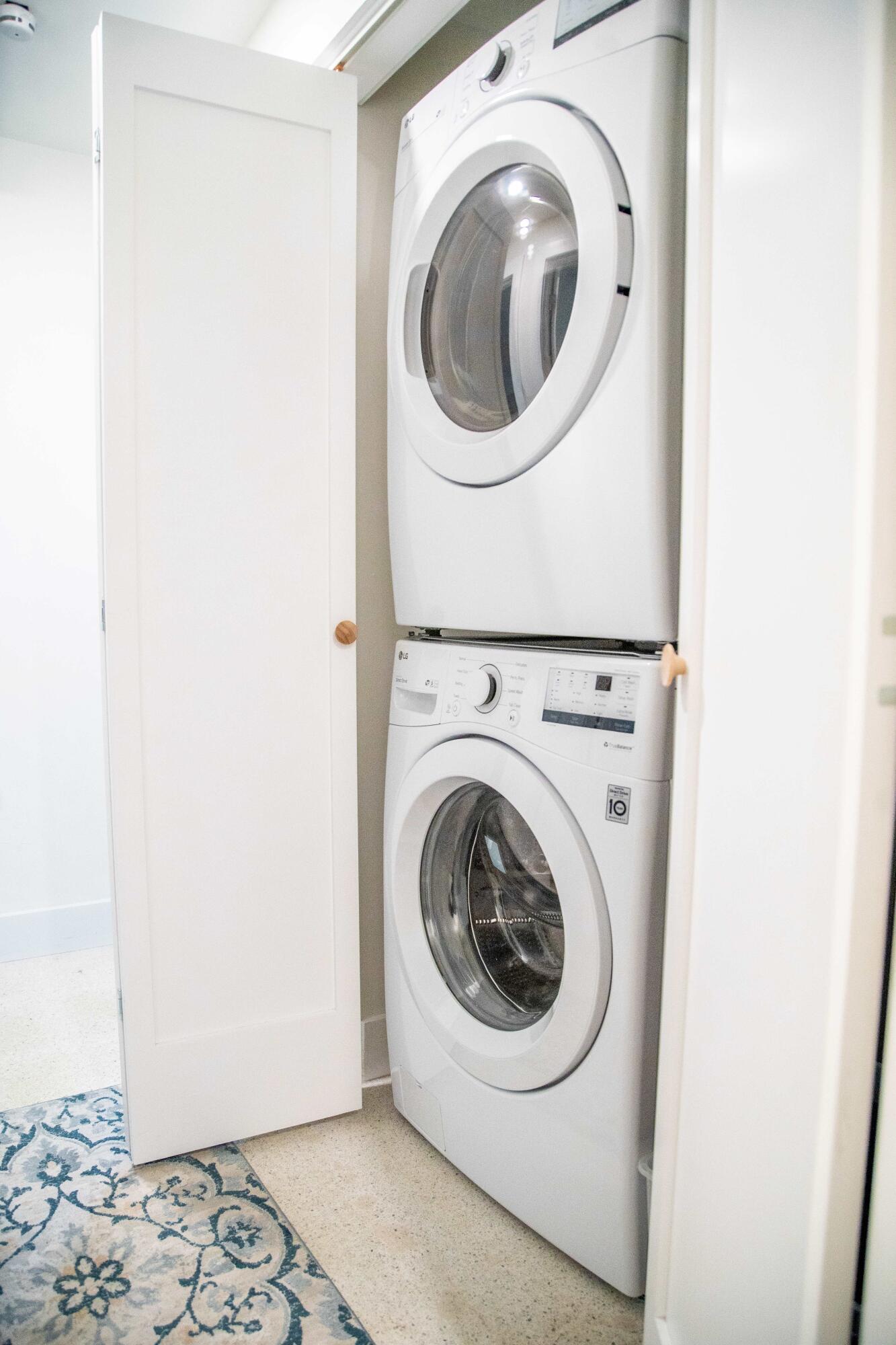 22 Van Road Jupiter, FL 33469 - Photo 29 of 38 a utility room with dryer and washer