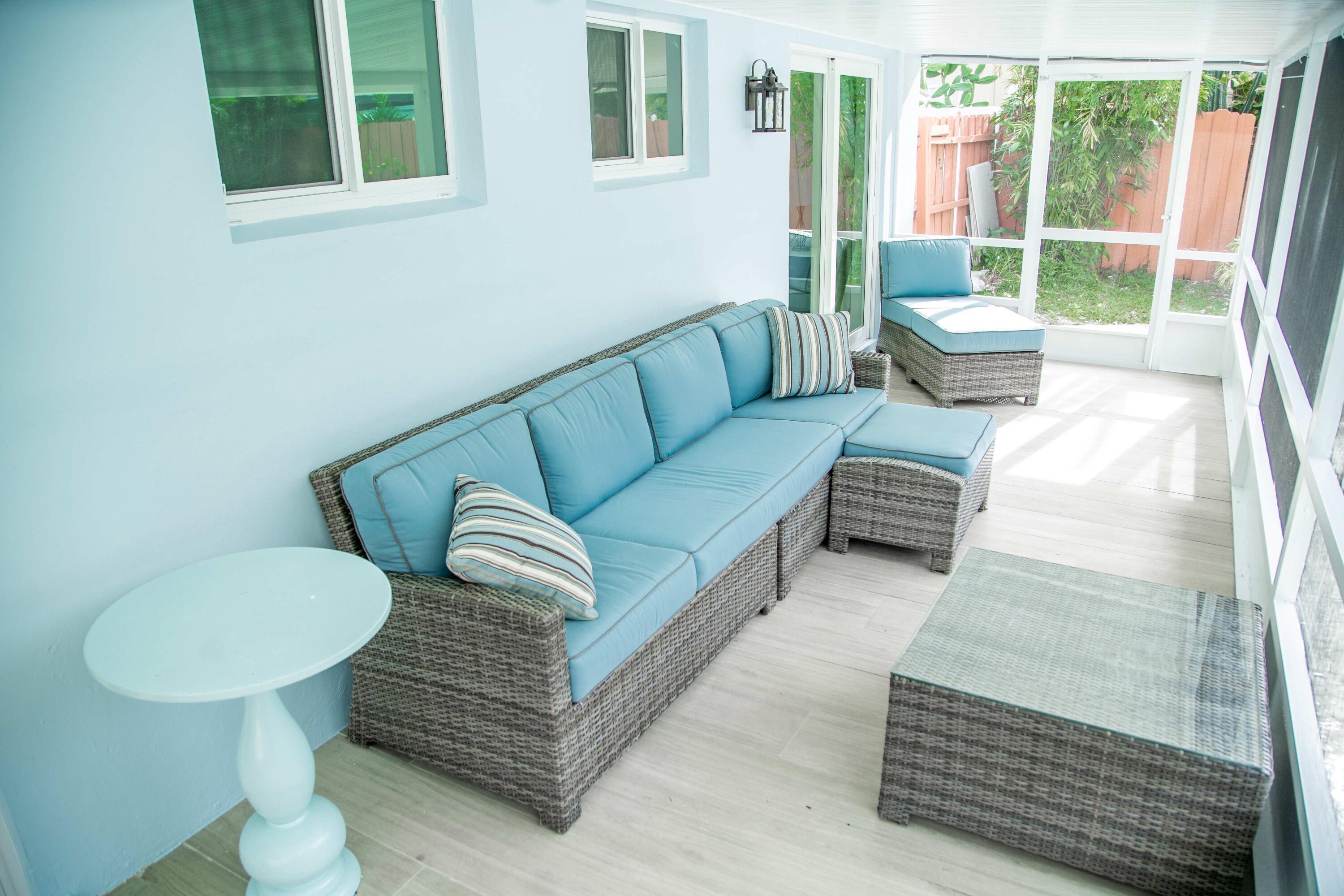 22 Van Road Jupiter, FL 33469 - Photo 31 of 38 a living room with furniture and a window