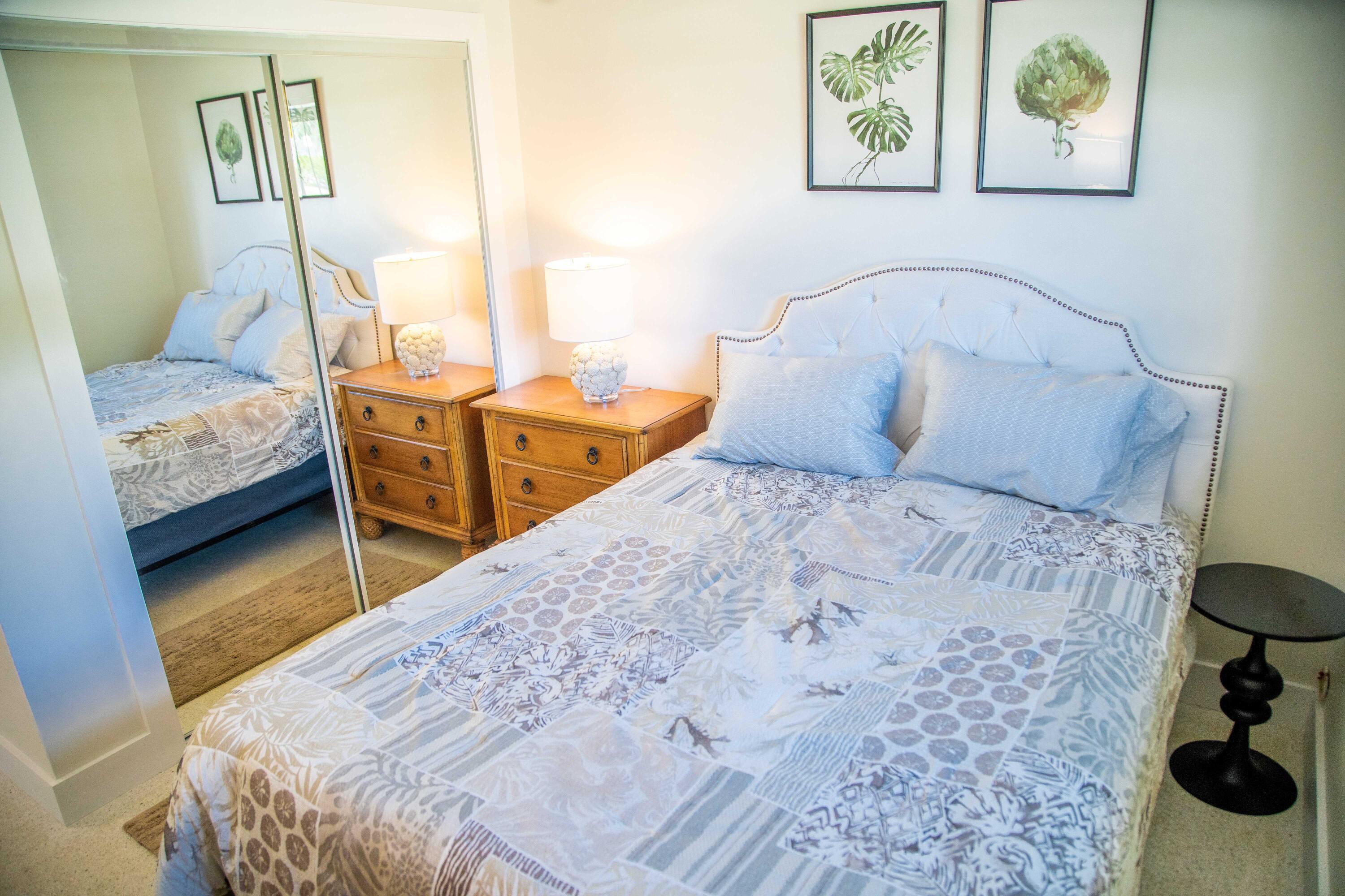 22 Van Road Jupiter, FL 33469 - Photo 7 of 38 a bedroom with a bed and wooden floor