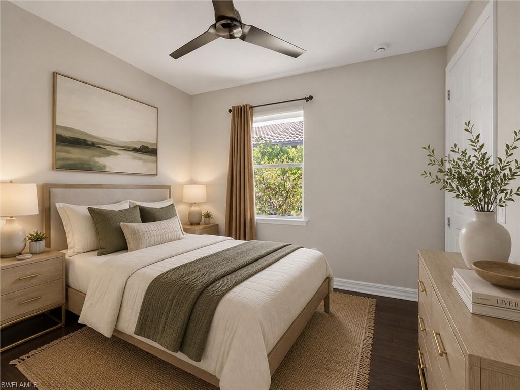 6124 Victory Drive Ave Maria, FL 34142 - Photo 12 of 50 a bedroom with a bed and a potted plant