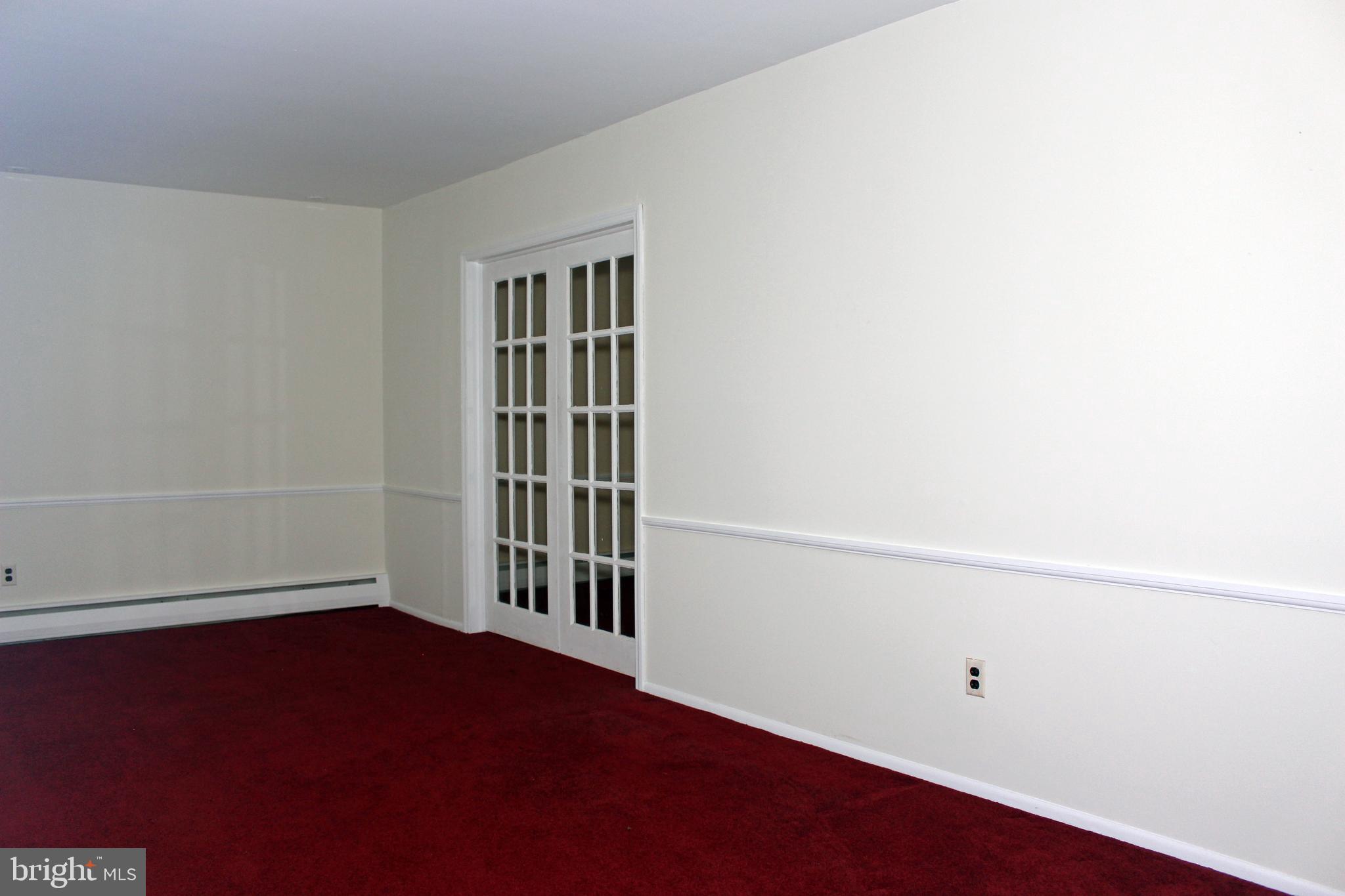340 Yoder Road Harleysville, PA 19438 - Photo 8 of 40 Living Room - Doors to Dining Room