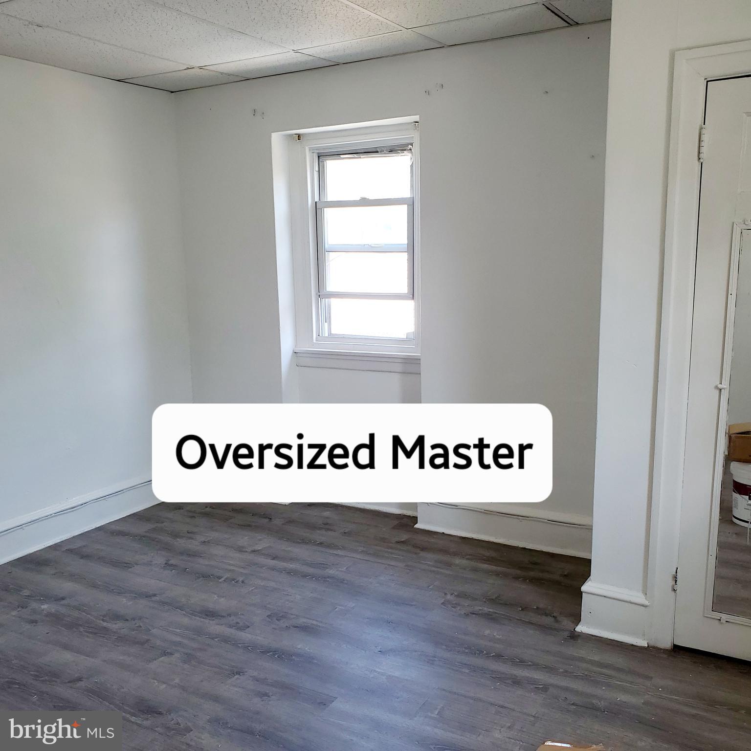 819 North 64th Street, Unit 3 Philadelphia, PA 19151 - Photo 7 of 12 a view of an entryway with wooden floor