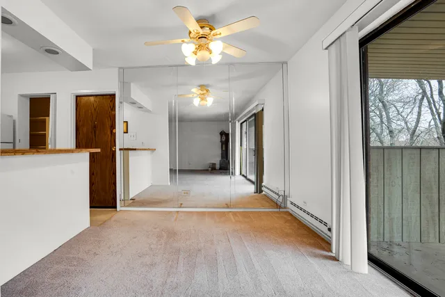 a view of a hallway with a chandelier