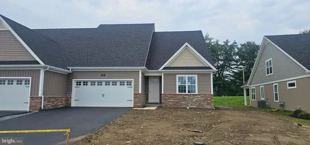a view of a house with garage