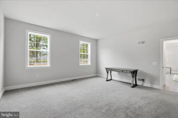 a bathroom with a sink and a window