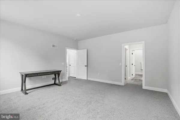 a view of a hallway with closet