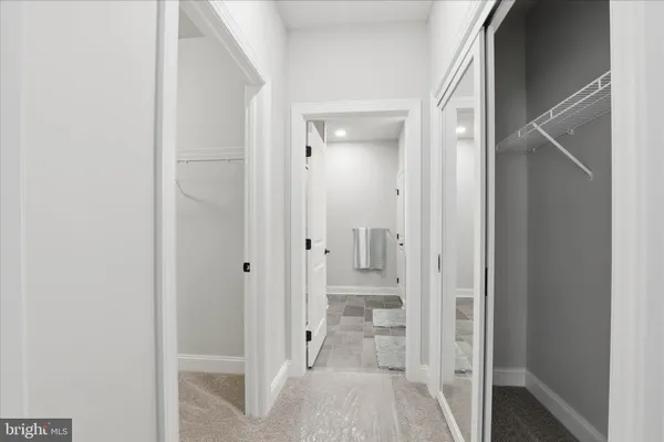 a view of a hallway with entryway