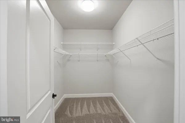 a bathroom with a sink toilet and vanity