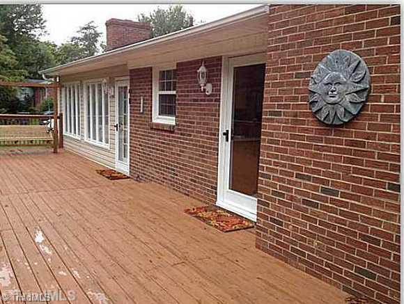 3220 Wide Country Road Pfafftown, NC 27040 - Photo 15 of 16 Patio/Deck. Large deck with swing.