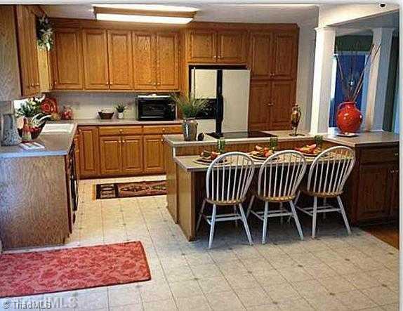 3220 Wide Country Road Pfafftown, NC 27040 - Photo 6 of 16 Kitchen. Large kitchen with island.