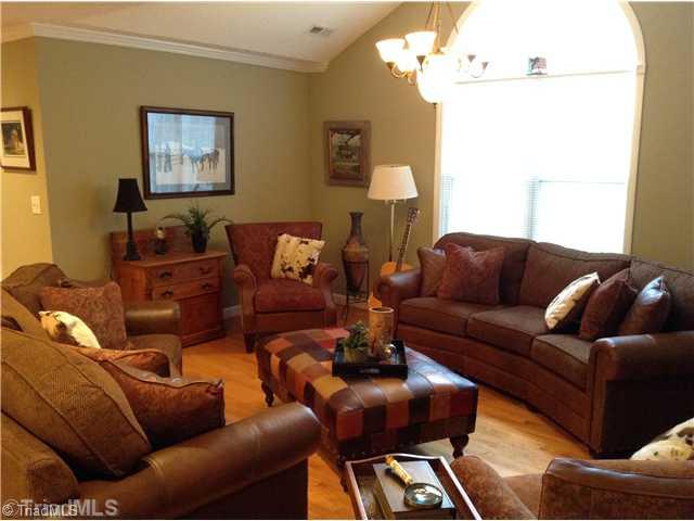 3220 Wide Country Road Pfafftown, NC 27040 - Photo 7 of 16 Den/Family/Great Room. Den with wood floors, abundant light and vaulted ceiling.