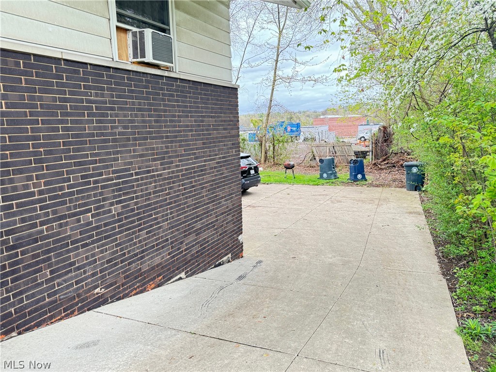 View of home's exterior featuring a patio area