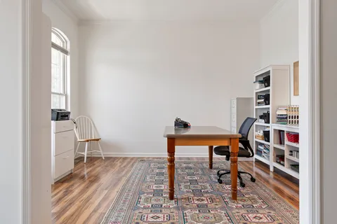 a bathroom with a sink a vanity and a mirror