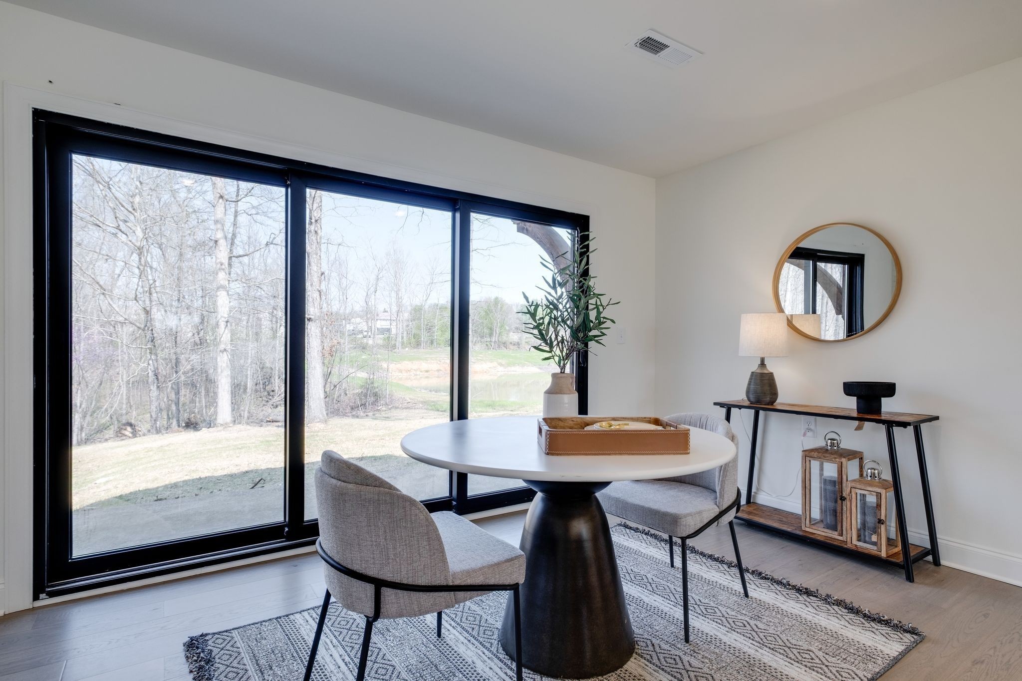 1510 East Piney Road Dickson, TN 37055 - Photo 25 of 66 a view of a dining room with furniture window and wooden floor