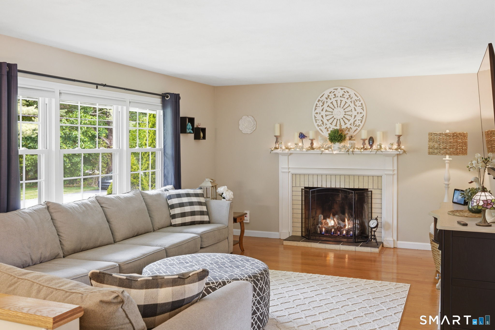 7 Stardust Drive Enfield, CT 06082 - Photo 3 of 38 a living room with furniture and a fireplace