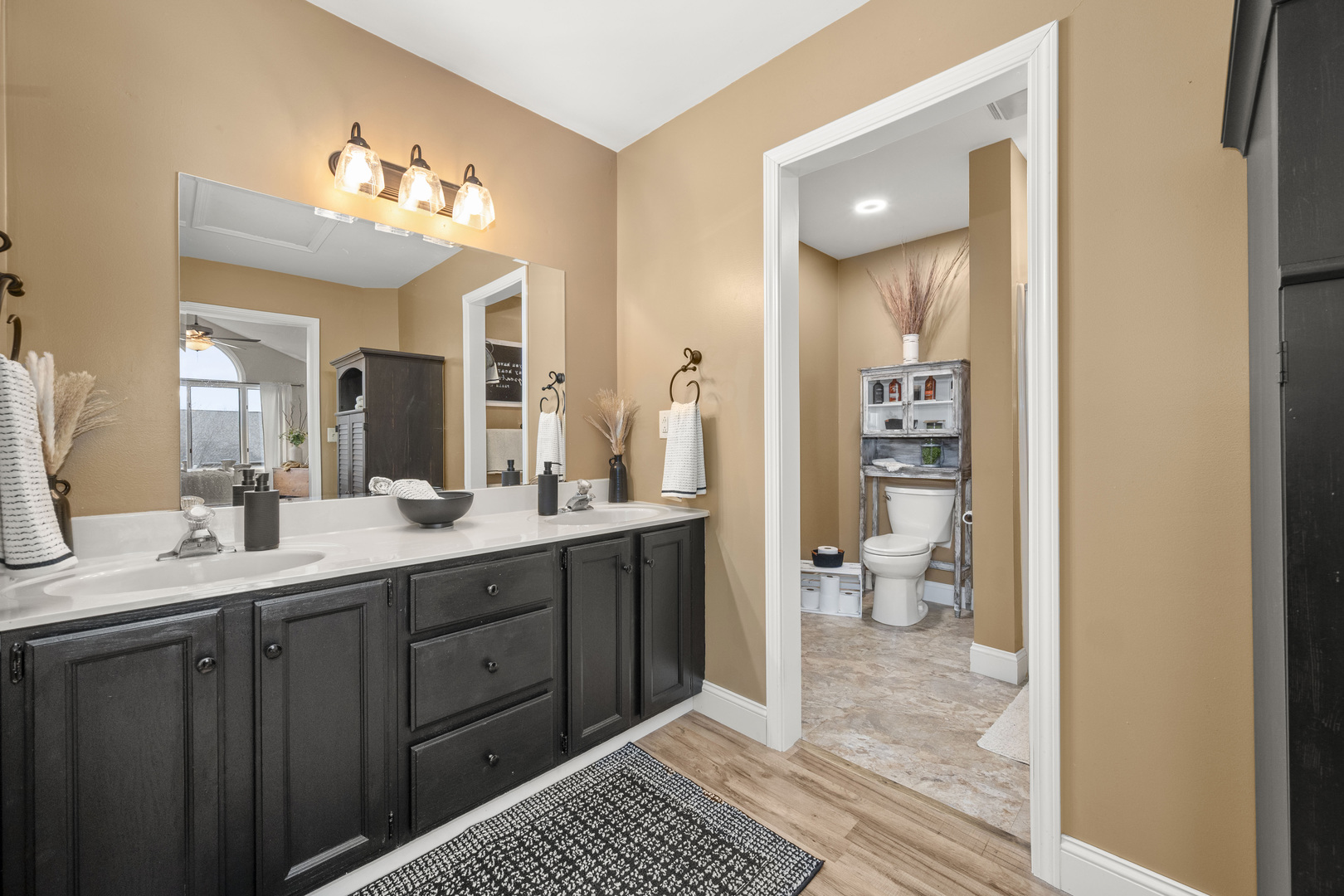 932 Foxpointe Drive Sycamore, IL 60178 - Photo 33 of 52 a spacious bathroom with a double vanity sink a mirror and a