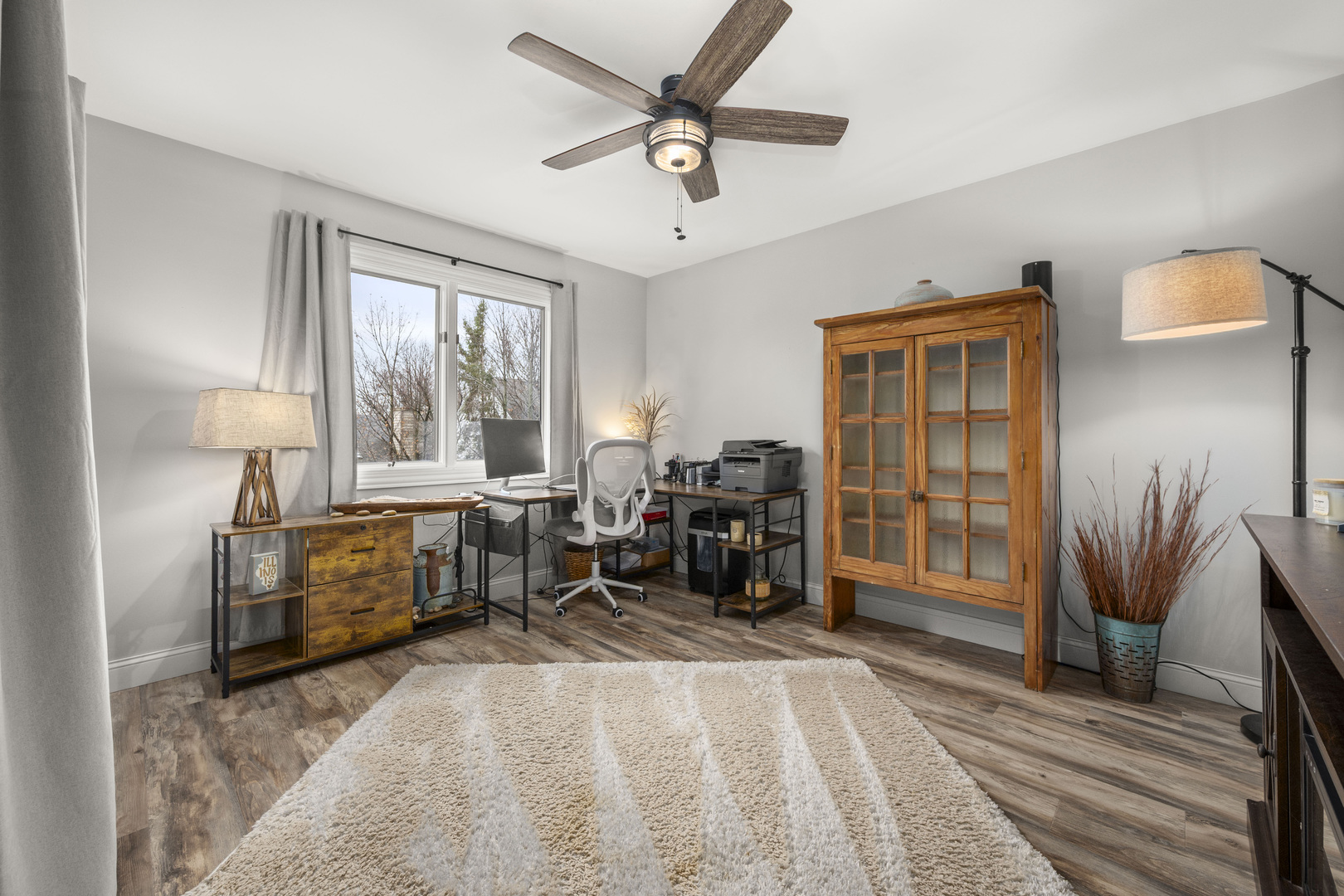 932 Foxpointe Drive Sycamore, IL 60178 - Photo 37 of 52 a bedroom with furniture and a large window