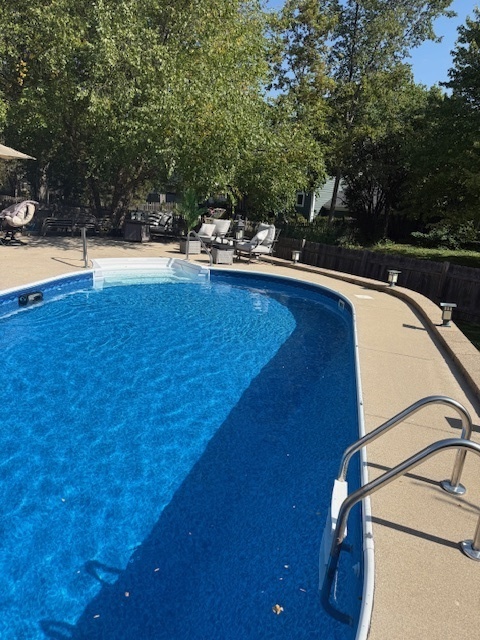 932 Foxpointe Drive Sycamore, IL 60178 - Photo 47 of 52 a view of a swimming pool with a patio