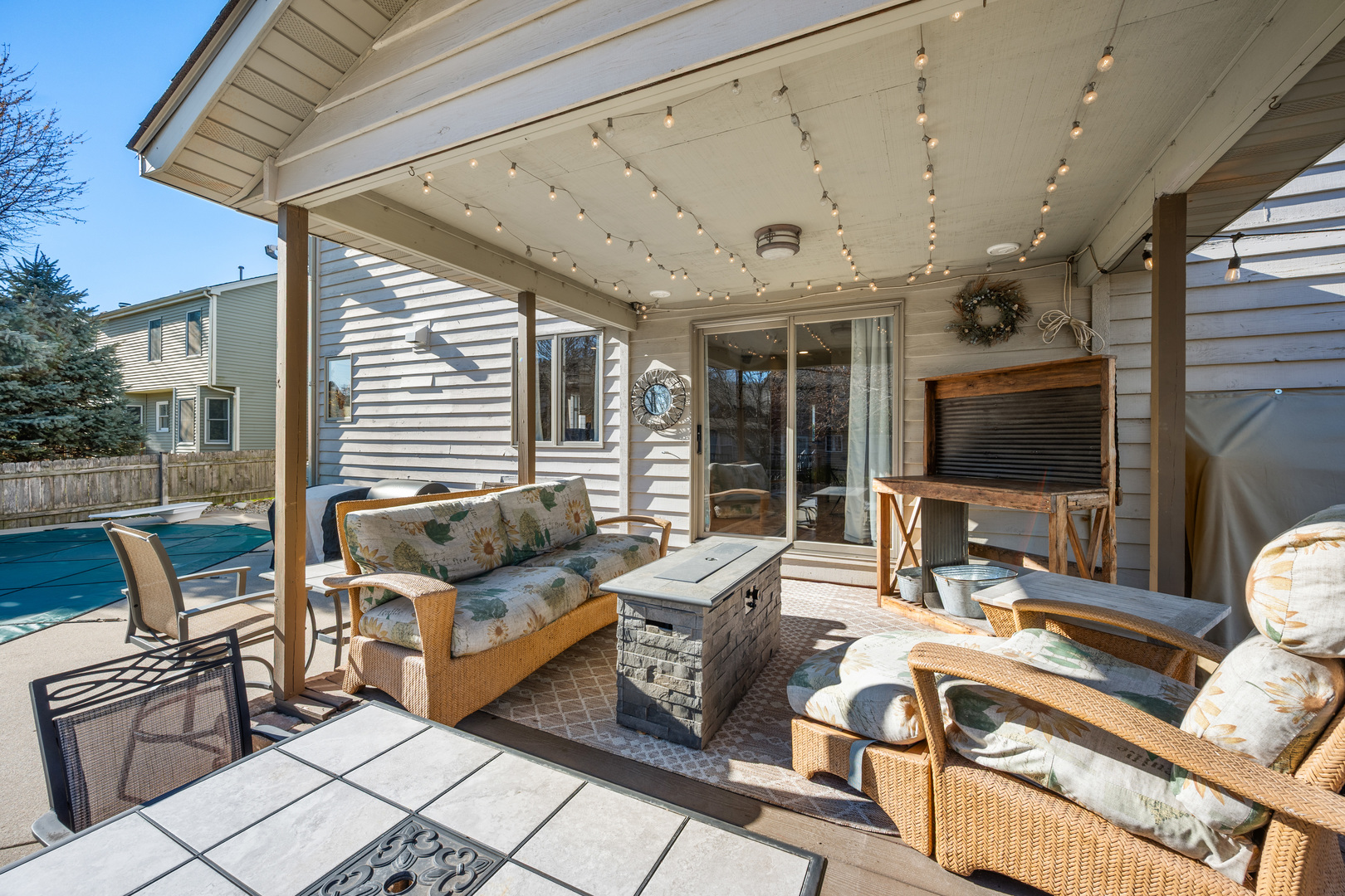 932 Foxpointe Drive Sycamore, IL 60178 - Photo 9 of 52 a living room with furniture and a flat screen tv