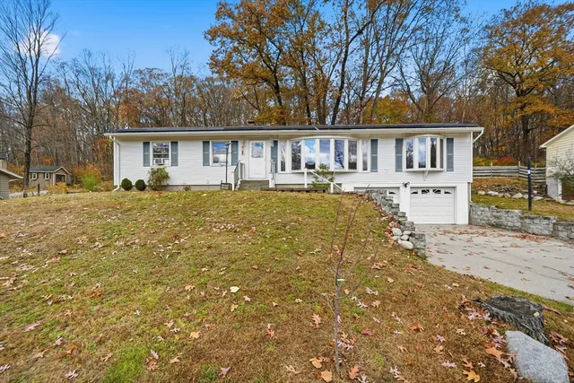 a front view of house with yard