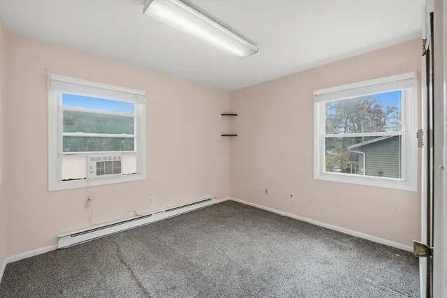 an empty room with windows