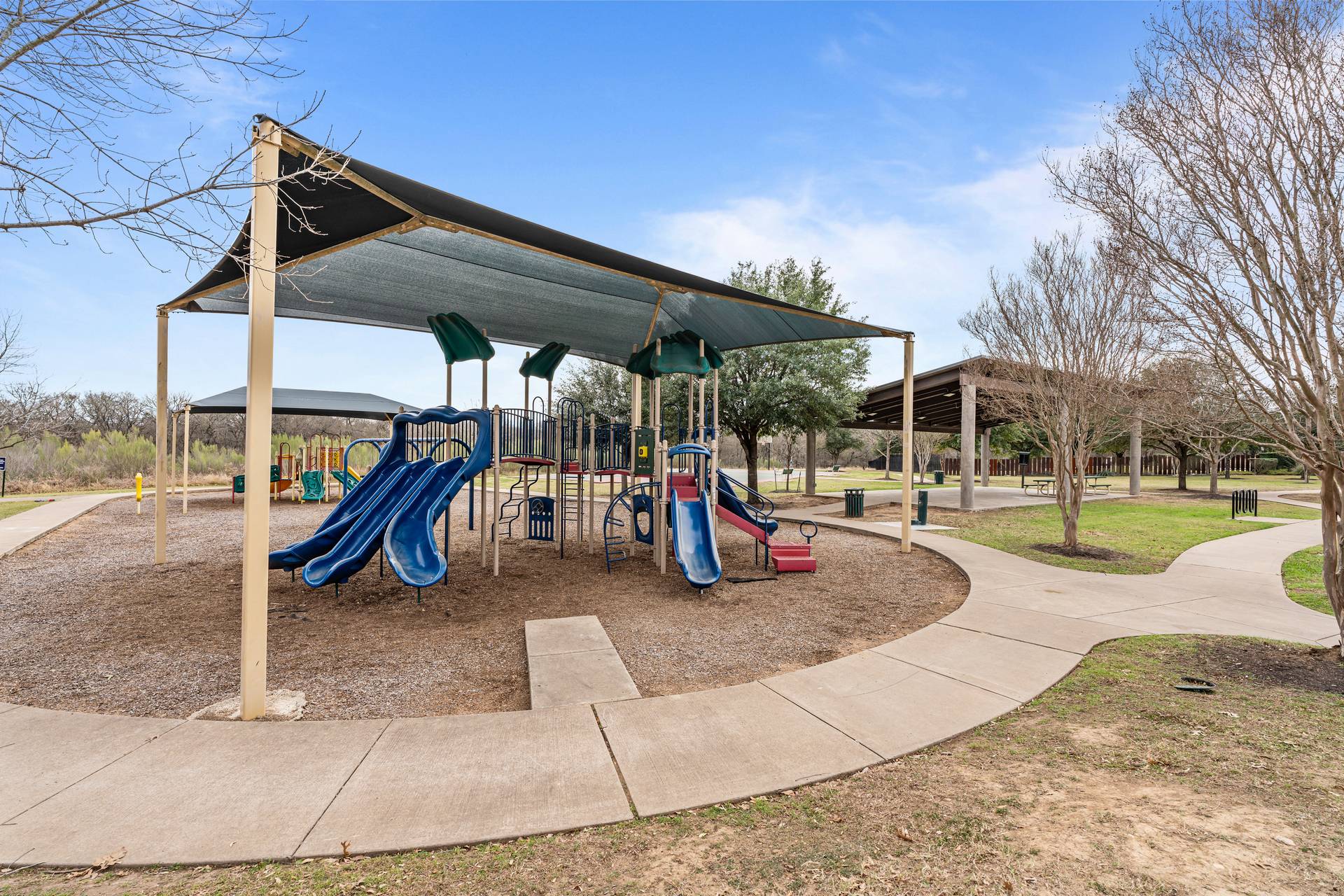 180 Fletcher Bend Buda, TX 78610 - Photo 32 of 36 a view of a park with slide
