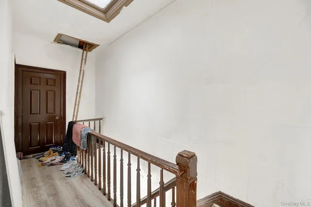 a view of a hallway with entryway