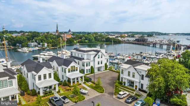 a picture of city view with lake view and boat