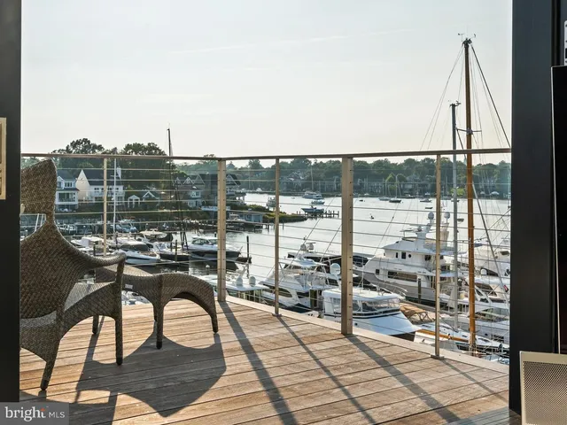 a view of a terrace with wooden benches