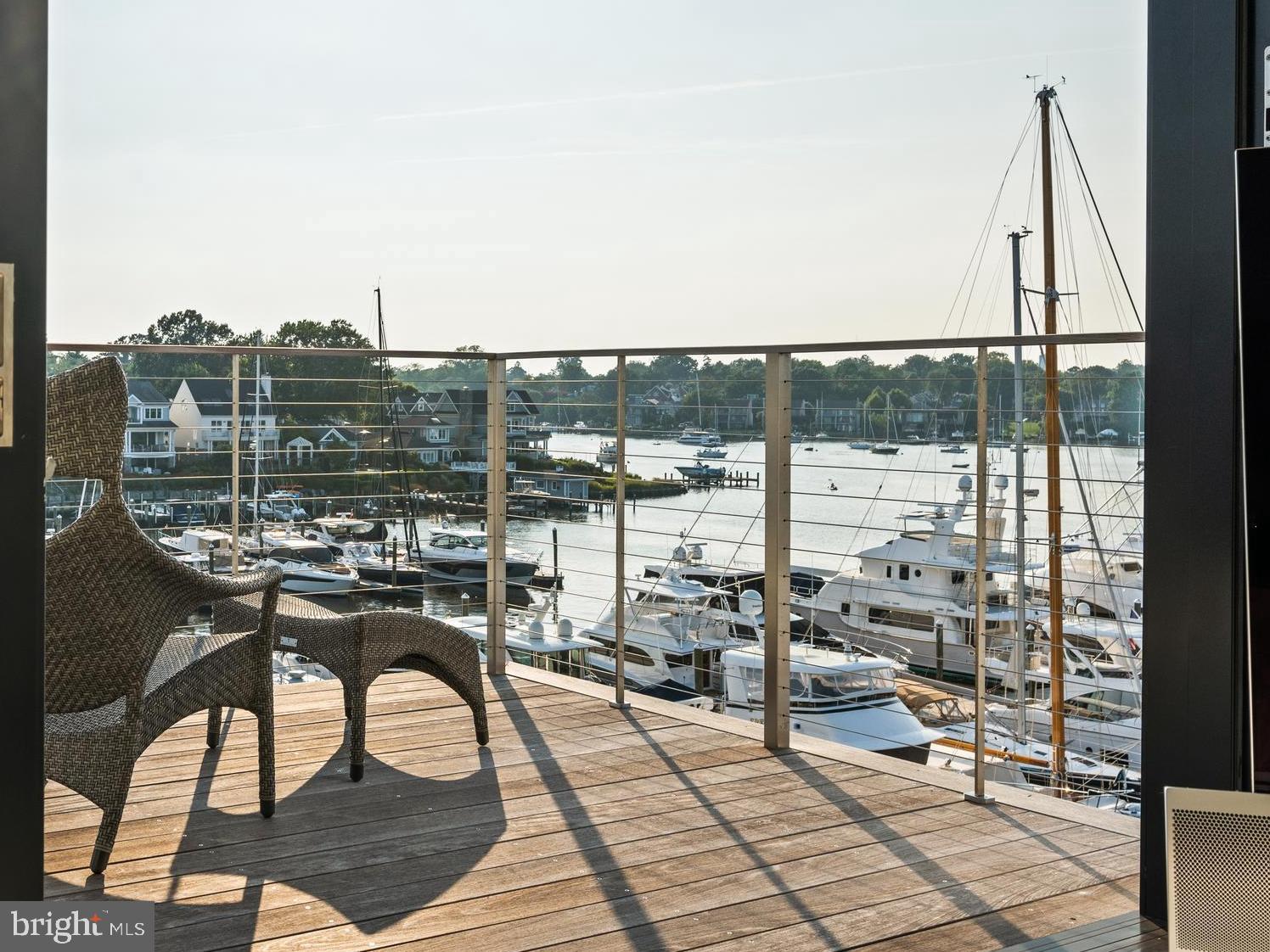 287 State Street, Unit 3 Annapolis, MD 21403 - Photo 24 of 43 a view of a terrace with wooden benches