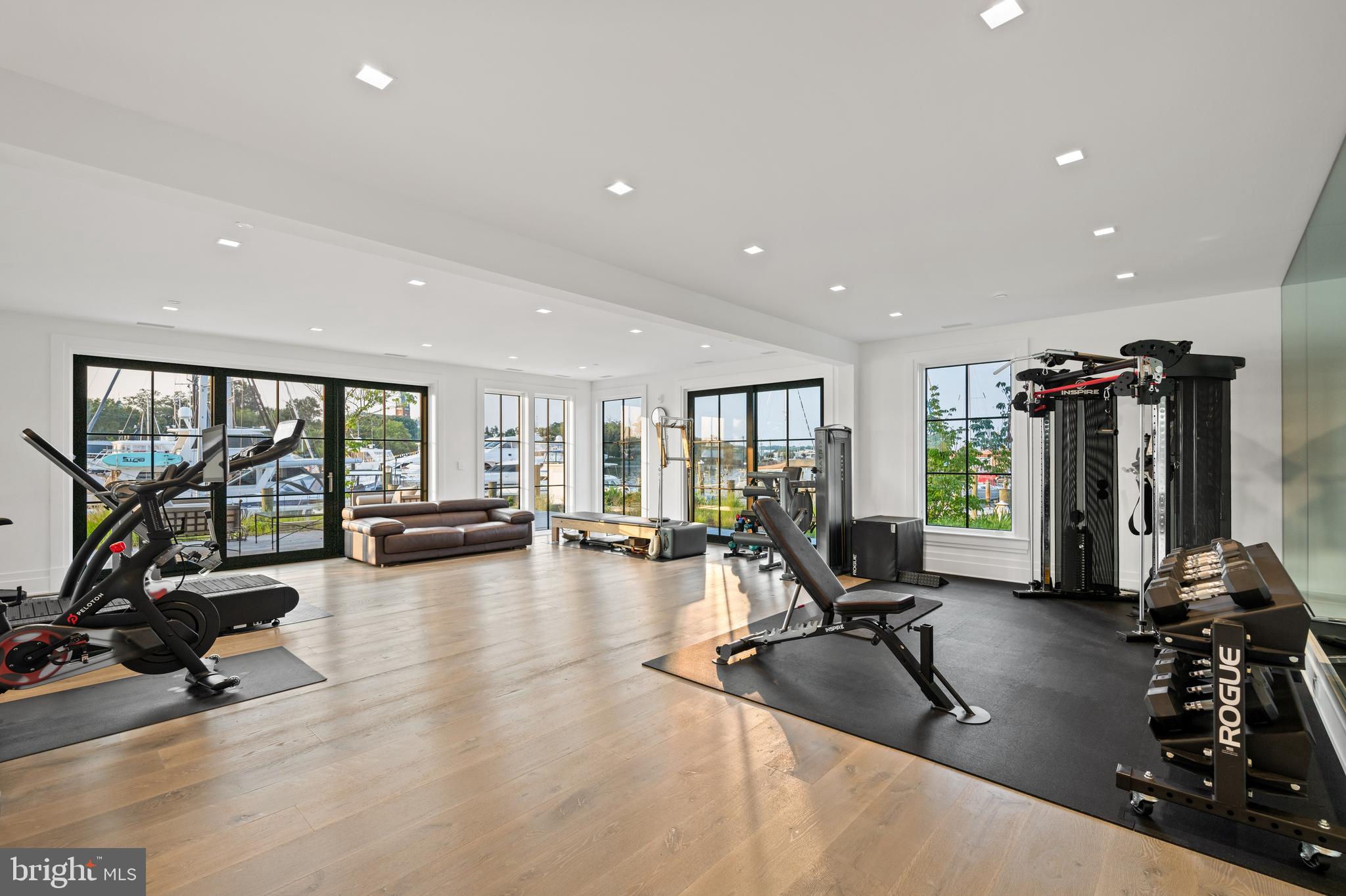 287 State Street, Unit 3 Annapolis, MD 21403 - Photo 34 of 43 a view of a room with gym equipment and a large window