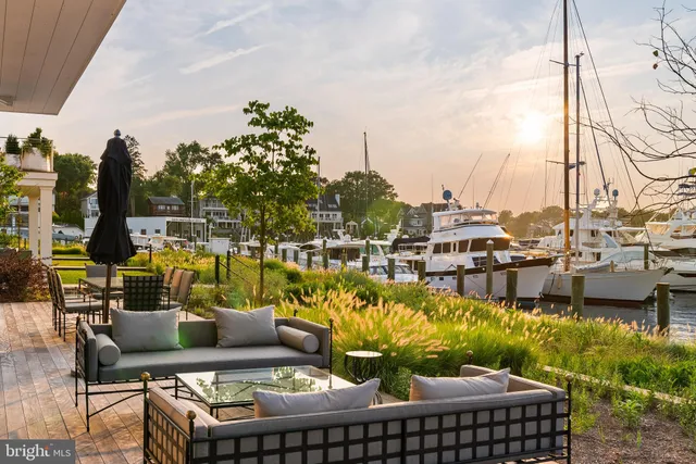 a view of a balcony with chairs