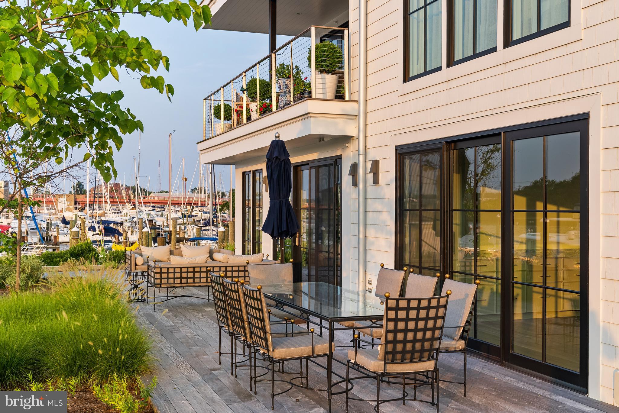 287 State Street, Unit 3 Annapolis, MD 21403 - Photo 39 of 43 a view of a patio with table and chairs and potted plants