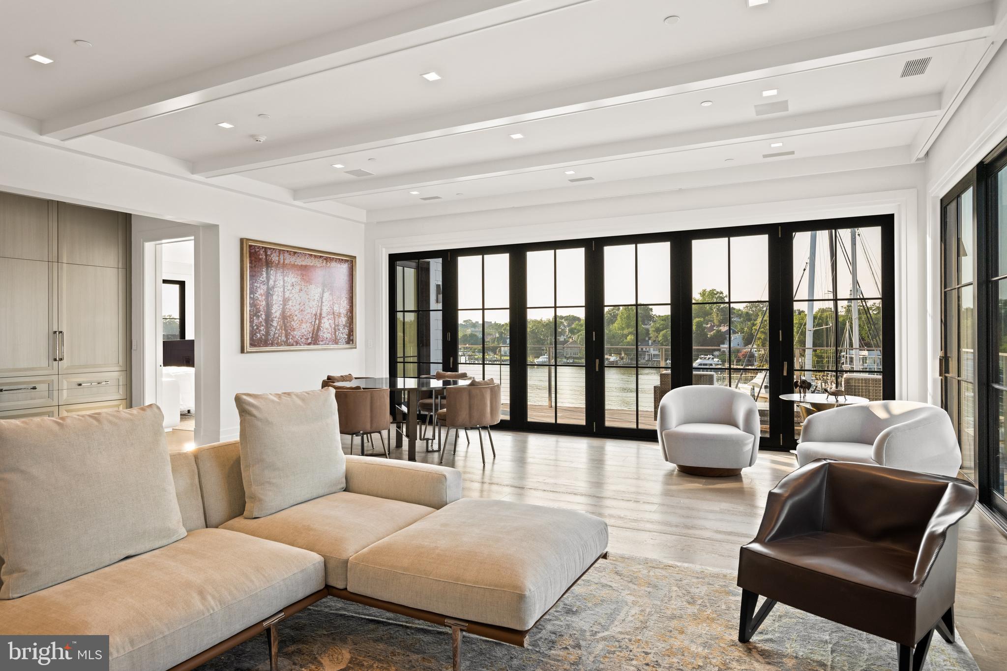 287 State Street, Unit 3 Annapolis, MD 21403 - Photo 8 of 43 a living room with furniture and a large window