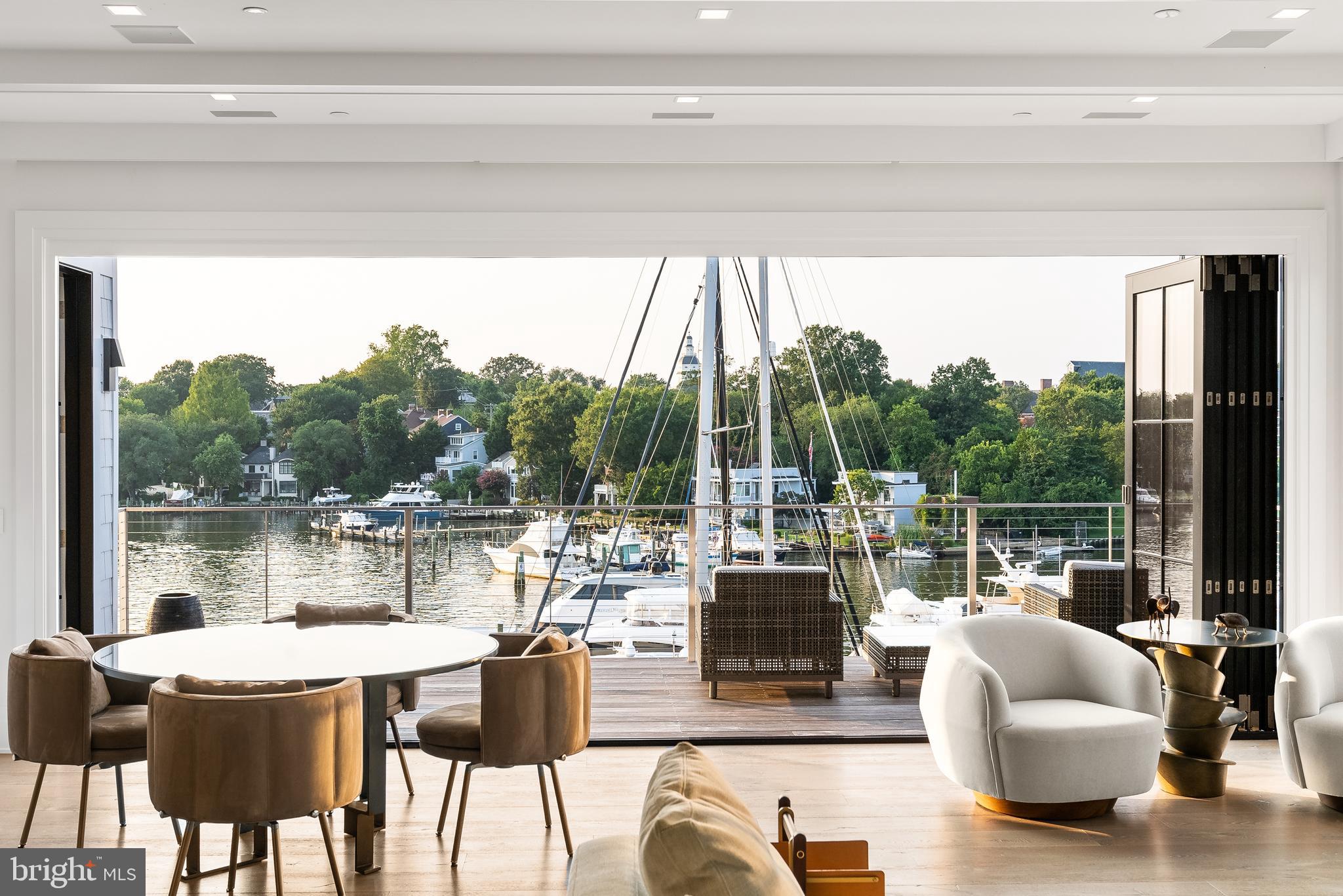 287 State Street, Unit 3 Annapolis, MD 21403 - Photo 9 of 43 a dining room with furniture and a large window