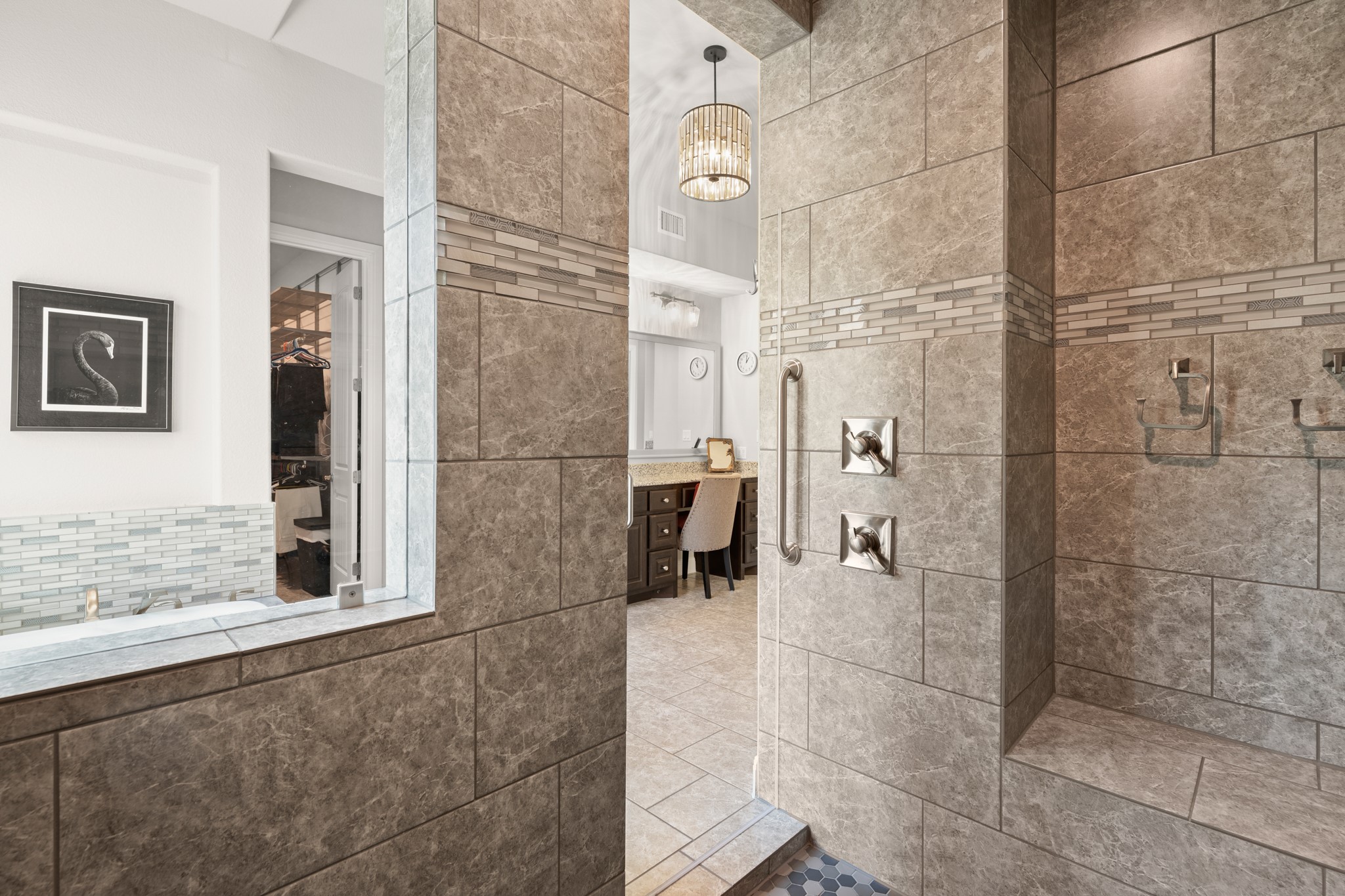 14913 Spillman Ranch Loop Austin, TX 78738 - Photo 21 of 40 A spacious walk-in shower features elegant finishes.