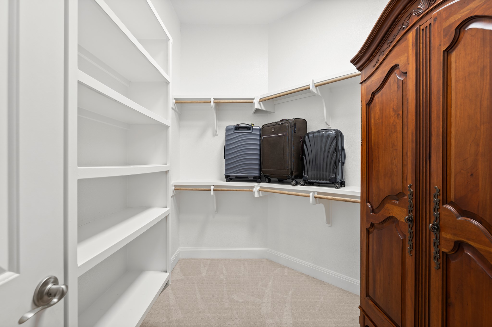 14913 Spillman Ranch Loop Austin, TX 78738 - Photo 23 of 40 Thoughtfully designed layouts maximize both hanging and shelving space.