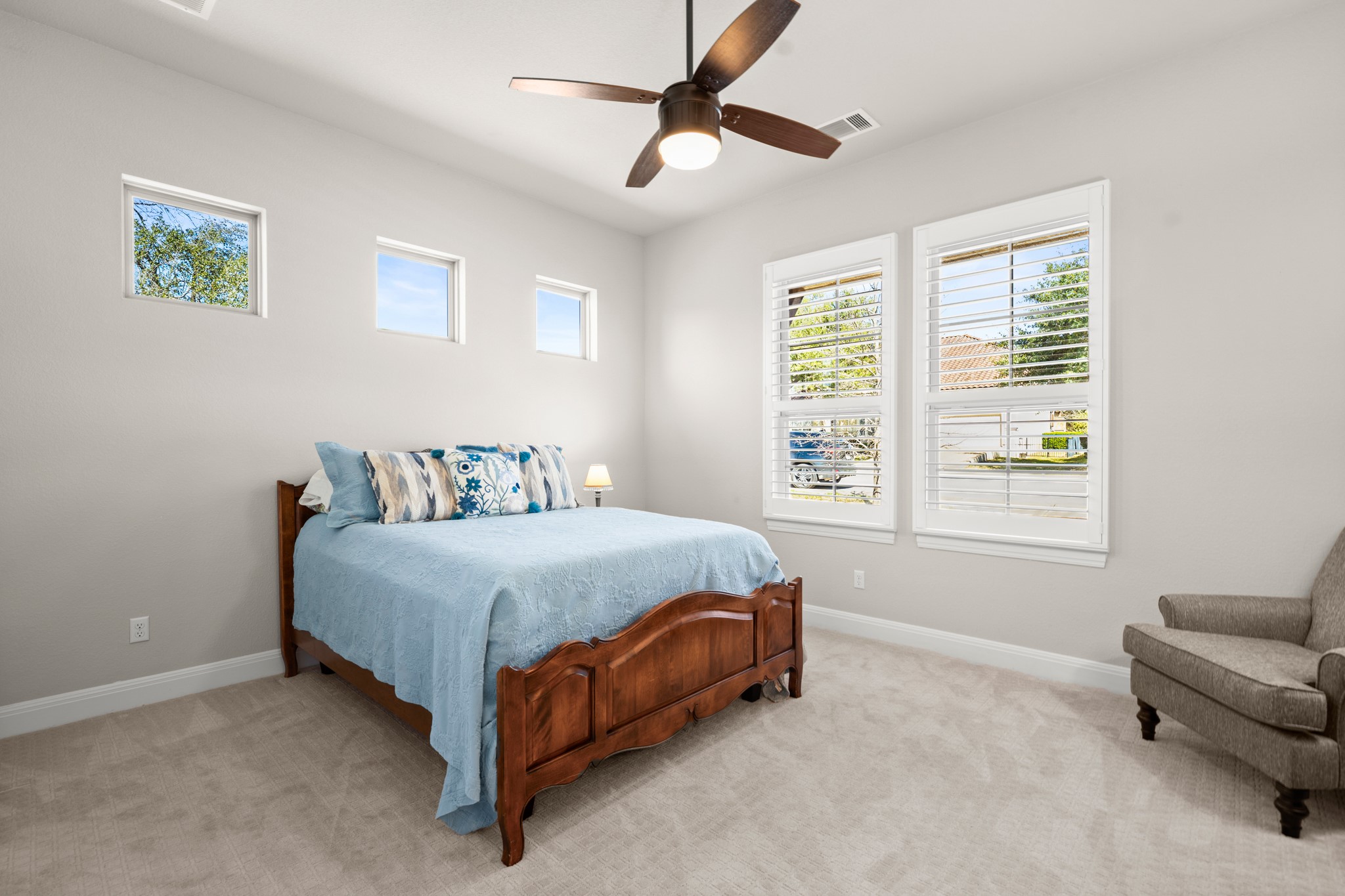 14913 Spillman Ranch Loop Austin, TX 78738 - Photo 24 of 40 Spacious guest bedrooms offer comfort and flexibility for family or visitors.