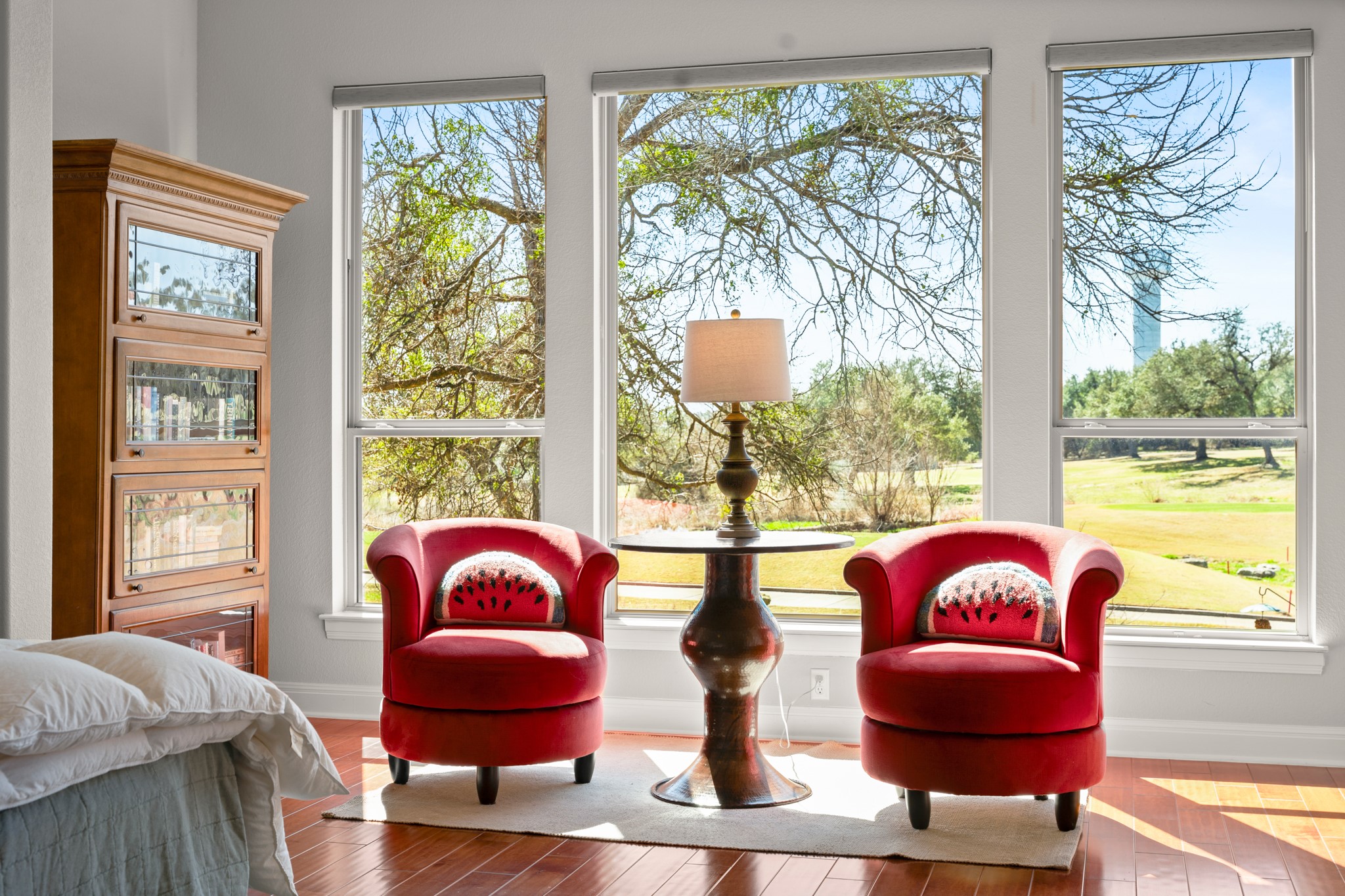 14913 Spillman Ranch Loop Austin, TX 78738 - Photo 2 of 40 A wall of windows showcases breathtaking golf course views.