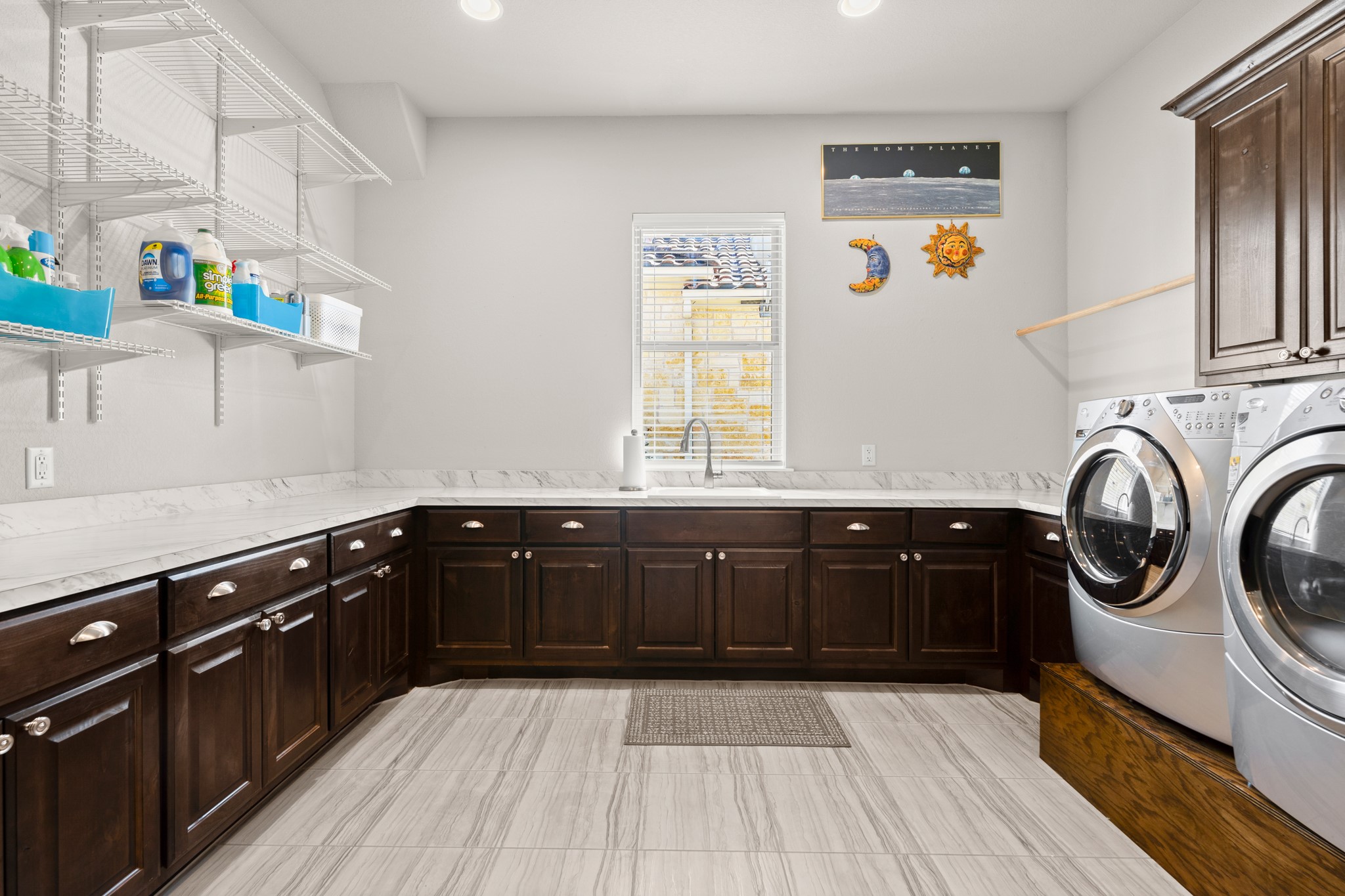 14913 Spillman Ranch Loop Austin, TX 78738 - Photo 30 of 40 The oversized laundry room offers exceptional space for everyday efficiency.