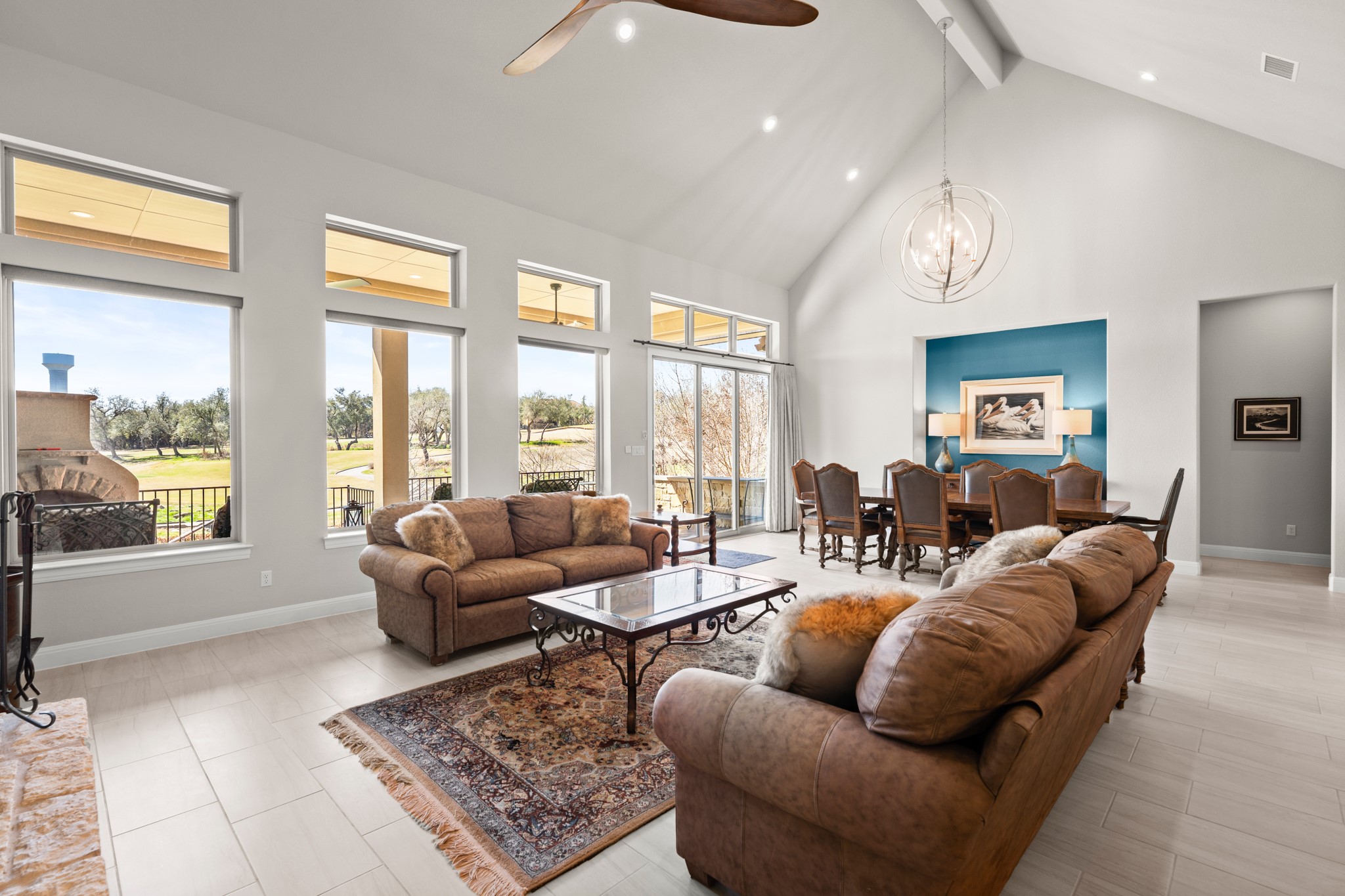 14913 Spillman Ranch Loop Austin, TX 78738 - Photo 3 of 40 The soaring vaulted ceiling creates a dramatic and airy atmosphere.