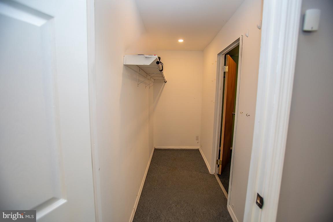 2818 Rome Road Vineland, NJ 08361 - Photo 11 of 31 a view of a hallway with a glass door