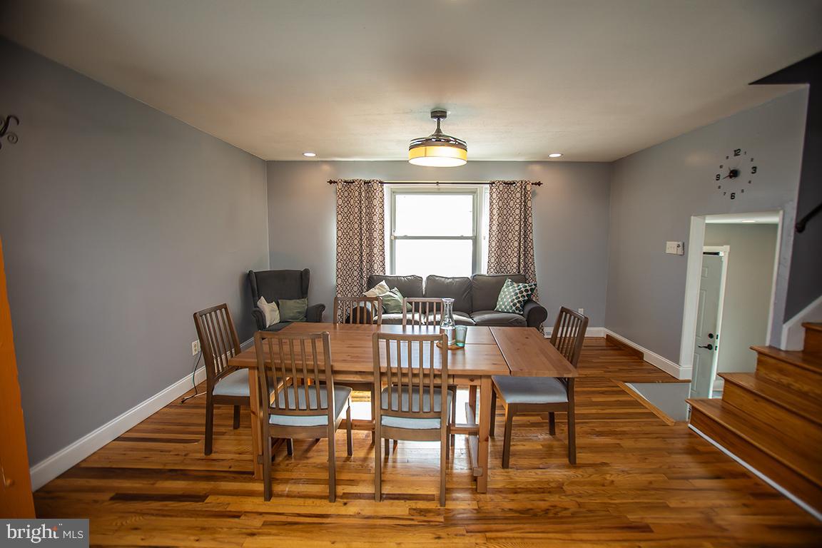 2818 Rome Road Vineland, NJ 08361 - Photo 12 of 31 a view of a a dining room with furniture window and wooden floor