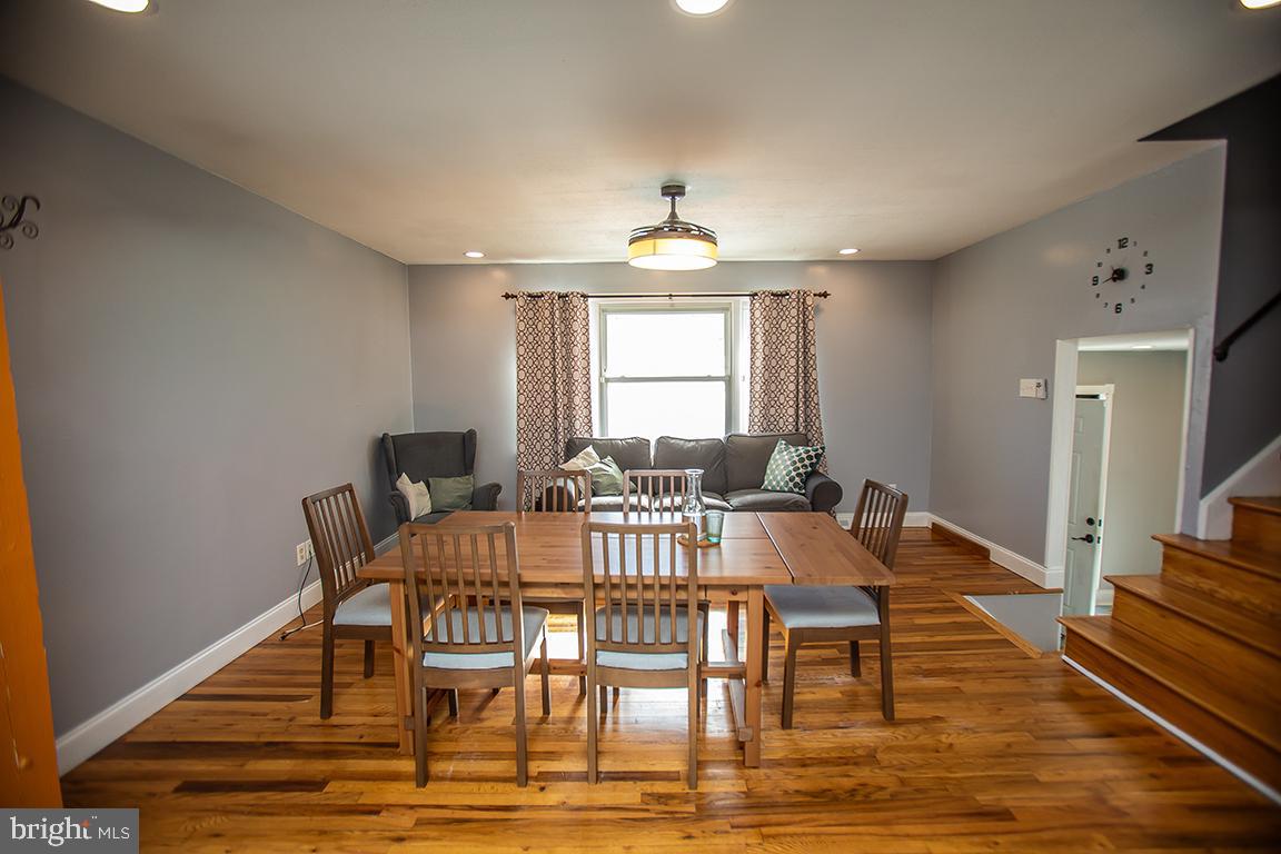2818 Rome Road Vineland, NJ 08361 - Photo 13 of 31 a view of a a dining room with furniture window and wooden floor