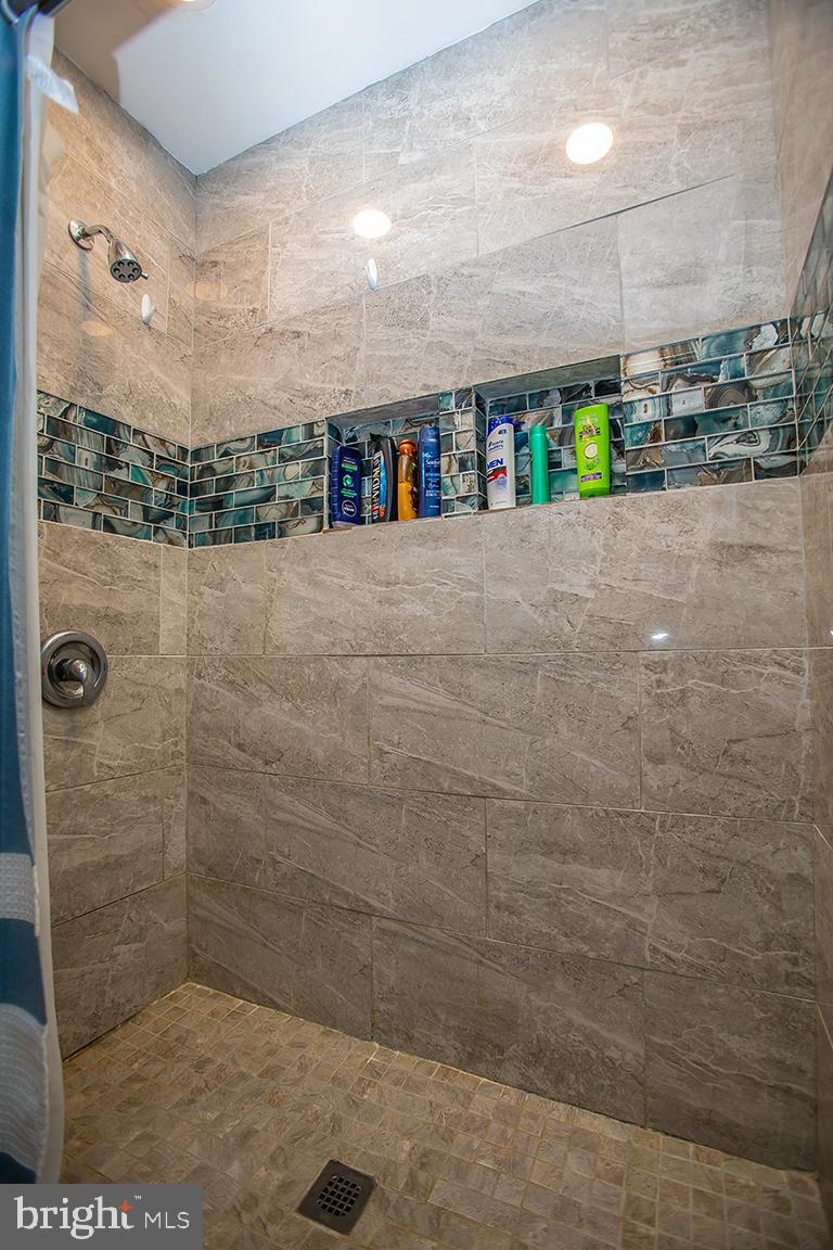 2818 Rome Road Vineland, NJ 08361 - Photo 24 of 31 a bathroom with a shower