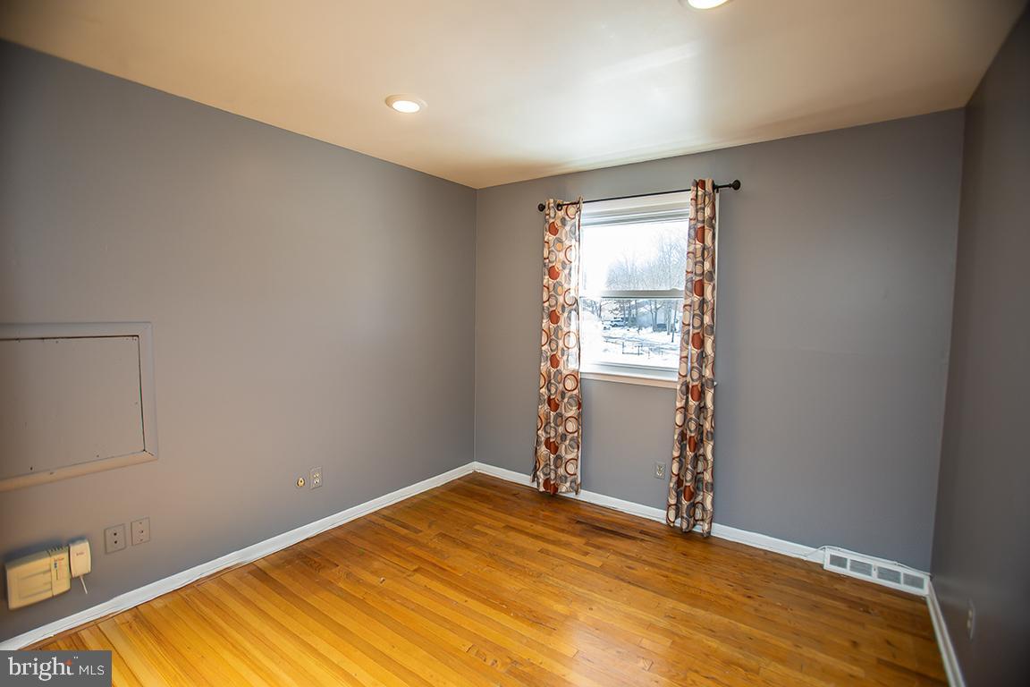 2818 Rome Road Vineland, NJ 08361 - Photo 25 of 31 a view of empty room with wooden floor