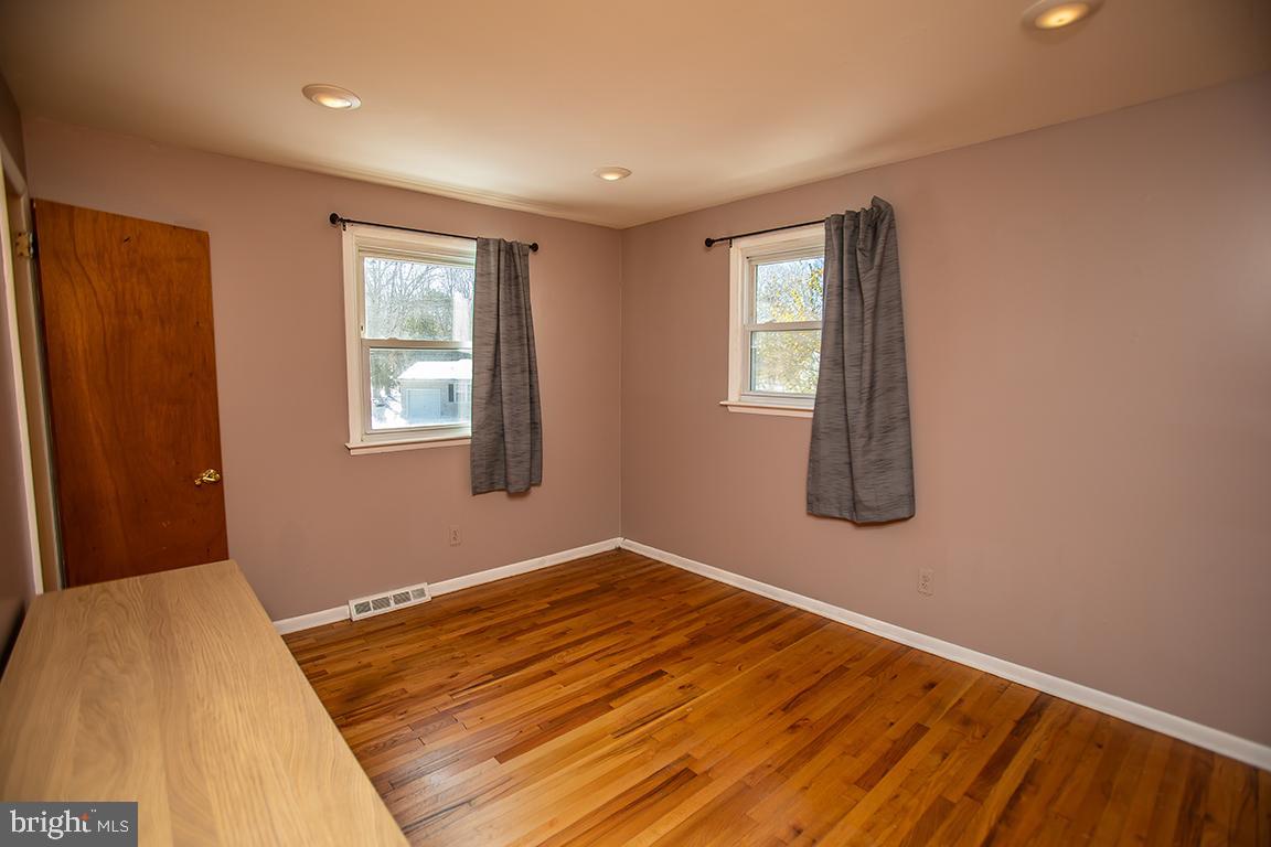 2818 Rome Road Vineland, NJ 08361 - Photo 28 of 31 a view of a room with wooden floor and window
