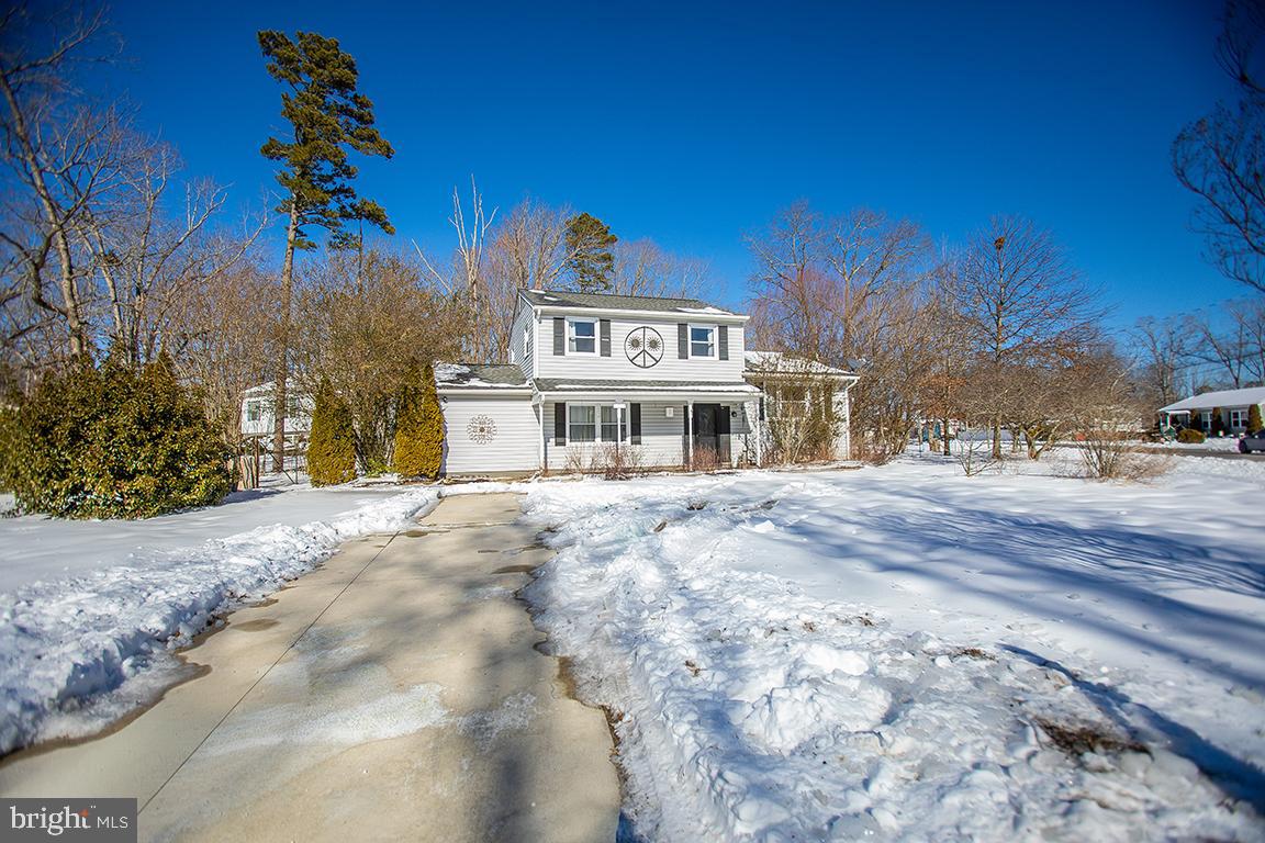 2818 Rome Road Vineland, NJ 08361 - Photo 30 of 31 a front view of a building with a yard