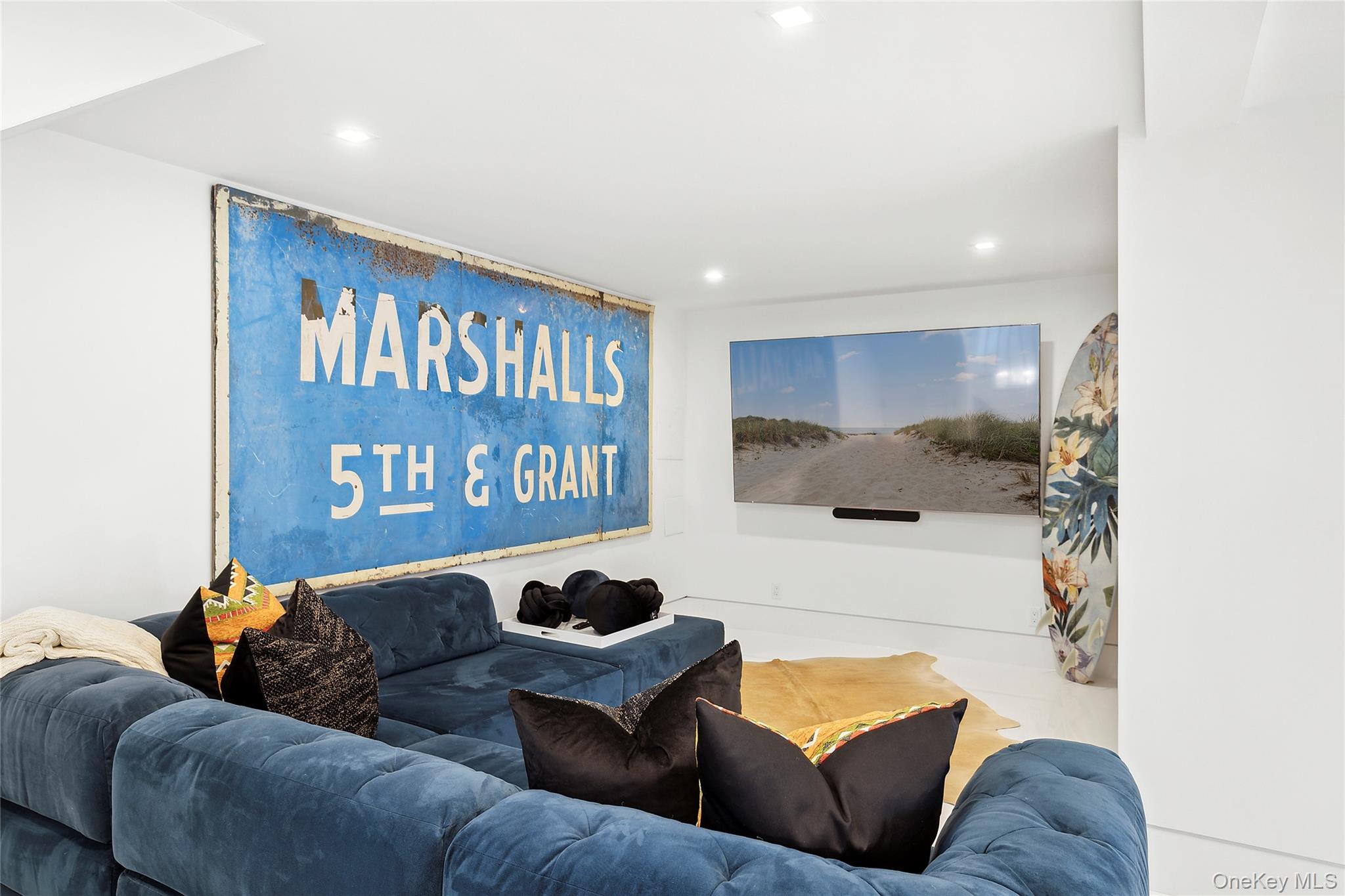 2803 Noyack Road Sag Harbor, NY 11963 - Photo 11 of 15 a living room with furniture and a couch