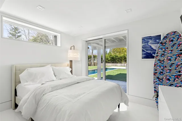 a view of a house with backyard and porch